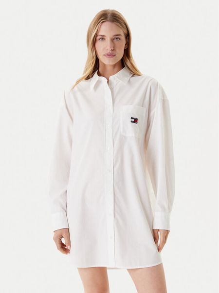 Tommy Jeans Sukienka koszulowa DW0DW21122 Biały Relaxed Fit. Białe sukienki damskie Tommy Jeans, xs, bez wzorów, z bawełny, bez kołnierzyka, bez ramiączek, koszulowe. Za 249.99 zł.