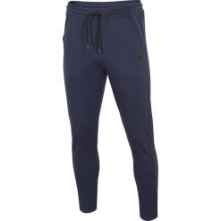 Spodnie dresowe męskie SPMD302 - granat melanż. Spodnie sportowe męskie 4F, m, bez wzorów, z dresówki. Za 139.99 zł.