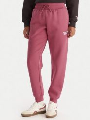 Reebok Spodnie dresowe Erika RK25164CCW Różowy Regular Fit. Czerwone spodnie dresowe damskie Reebok, bez wzorów, z dresówki. Za 199.99 zł.