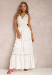 Biała Sukienka Corisis. Białe sukienki damskie Renee, m, w ażurowe wzory, bez kołnierzyka, bez ramiączek, maxi, kopertowe. Za 74.99 zł.