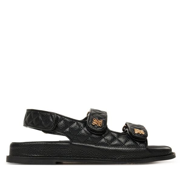 Sandały Nine West. Czarne sandały damskie Nine West, bez wzorów, bez obcasa, na płaskiej podeszwie, bez zapięcia. Za 279.99 zł.