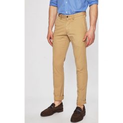 Polo Ralph Lauren - Spodnie. Brązowe eleganckie spodnie męskie Polo Ralph Lauren, bez wzorów, z bawełny. W wyprzedaży za 359.90 zł.