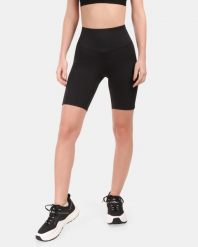 Damskie krótkie legginsy Kilpi ARTEMI-W. Czarne legginsy damskie Kilpi, bez wzorów, z materiału. Za 215.49 zł.