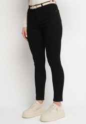 Czarne Jeansy z Bawełny o Kroju Slim Felestra. Czarne jeansy damskie Born2be, bez wzorów, z bawełny, eleganckie. Za 79.99 zł.