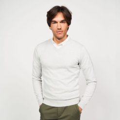 Sweter do golfa męski CW 100. Niebieskie swetry męskie INESIS, l, bez wzorów, z bawełny, eleganckie, bez kołnierzyka, bez ramiączek. Za 69.99 zł.