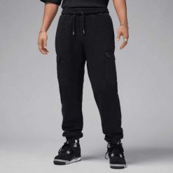 Spodnie męskie Air Jordan Flight Sherpa Pants Czarne - FV7450-010. Czarne spodnie sportowe męskie Jordan, m, bez wzorów, z dresówki, do koszykówki. Za 389.85 zł.