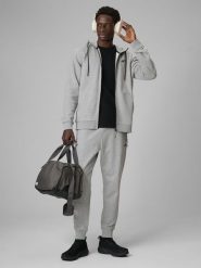 4F Spodnie dresowe joggery męskie - szare L. Szare spodnie materiałowe męskie 4F, l, bez wzorów, z dresówki, na fitness i siłownię. Za 149.99 zł.