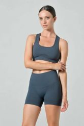 Damskie krótkie legginsy push-up z wysokim stanem Omm Yoga by Risalti Sculpt. Niebieskie legginsy sportowe damskie OM, l, bez wzorów, z elastanu, z podwyższonym stanem, krótkie, na fitness i siłownię. Za 199.99 zł.