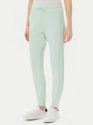 Guess Spodnie dresowe V2YB18 K7UW2 Zielony Regular Fit. Zielone spodnie dresowe damskie Guess, z aplikacjami, z dresówki. Za 229.99 zł.
