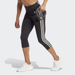 Damskie legginsy z wysoką talią adidas Designed To Move 3-Bandes 3/4 Sport. Białe legginsy damskie Adidas, bez wzorów, z elastanu. Za 190.45 zł.