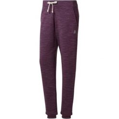 Spodnie damskie Reebok TE Marble Pant. Czarne spodnie dresowe damskie Reebok, bez wzorów, z dresówki, sportowe. Za 142.99 zł.
