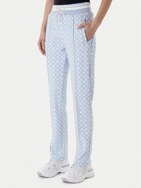 Guess Spodnie dresowe V5YB20 KB212 Błękitny Regular Fit. Niebieskie spodnie sportowe damskie Guess, z aplikacjami, z dresówki. Za 399.99 zł.