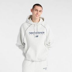 Bluza męska New Balance MT611629AHH – szara. Szare bluzy męskie New Balance, m, bez wzorów, z bawełny, z kapturem. Za 299.99 zł.