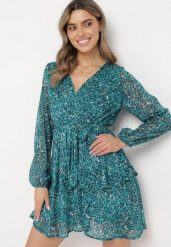 Niebieska Sukienka Lalessa. Niebieskie sukienki damskie Born2be, l, z aplikacjami, z materiału, bez kołnierzyka, bez ramiączek, mini, kopertowe. Za 109.99 zł.