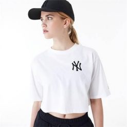 Koszulka sportowa damska New Era Neyyan. Białe koszulki sportowe damskie New Era, s, bez wzorów, z bawełny, bez ramiączek. Za 275.00 zł.
