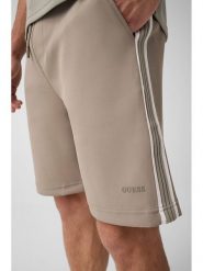 Guess Spodnie materiałowe 183578 Zielony Bermuda Fit. Zielone spodnie materiałowe męskie Guess, z aplikacjami, z materiału. Za 344.99 zł.