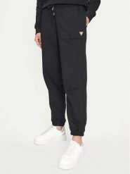 Guess Jeans Spodnie dresowe W4YB33 KC811 Czarny Regular Fit. Czarne spodnie dresowe damskie Guess Jeans, z aplikacjami, z bawełny. Za 209.99 zł.