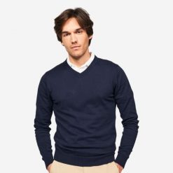 Sweter do golfa męski MW 100 dekolt w serek. Niebieskie swetry męskie INESIS, l, bez wzorów, z bawełny, eleganckie, bez kołnierzyka, bez ramiączek. Za 69.99 zł.