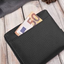 Paolo Peruzzi Portfel damski klasyczny skórzany czarny RFID T-139-BL. Czarne portfele damskie Paolo Peruzzi. Za 130.47 zł.