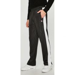 Fila - Spodnie. Czarne spodnie materiałowe męskie Fila, bez wzorów, z poliesteru. W wyprzedaży za 199.90 zł.