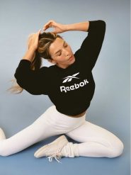 Reebok Bluza Reebok X Ewa Chodakowska RK25318CCW Czarny Regular Fit. Czarne bluzy damskie Reebok, xl, bez wzorów, z bawełny, bez ramiączek, bez kaptura. Za 179.99 zł.