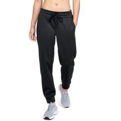 Spodnie treningowe damskie Under Armour Recovery Travel Track. Czarne spodnie sportowe damskie Under Armour, bez wzorów, z dresówki, sportowe, na fitness i siłownię. Za 183.70 zł.