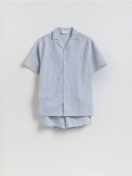 Dwuczęściowa piżama z lnem - jasnoniebieski. Niebieskie piżamy męskie Reserved, l, bez wzorów, z bawełny, bez kołnierzyka, bez ramiączek. Za 149.99 zł.