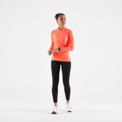 Legginsy do biegania damskie Kiprun Run 900 Light. Czarne legginsy damskie KIPRUN, bez wzorów, z elastanu. W wyprzedaży za 99.99 zł.