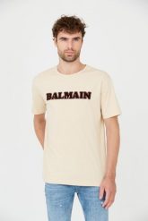 BALMAIN Beżowy t-shirt Retro Balmain Flock. Brązowe t-shirty męskie Balmain, m, bez wzorów, bez kołnierzyka, bez ramiączek. W wyprzedaży za 1,299.99 zł.