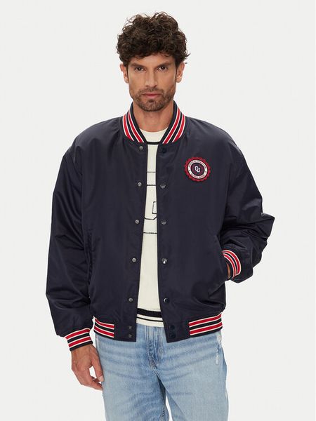 Guess Jeans Kurtka bomber M5YL15 WHAA2 Granatowy Regular Fit. Niebieskie kurtki męskie Guess Jeans, m, z aplikacjami, z jeansu, bez kaptura. Za 439.99 zł.