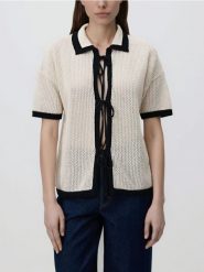 Sweter z wiązaniem - kremowy. Białe swetry nierozpinane damskie Reserved, l, bez wzorów, z bawełny, bez kołnierzyka, bez ramiączek. Za 119.99 zł.