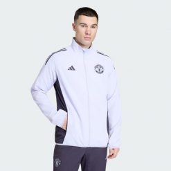 Kurtka reprezentacyjna Manchester United Tiro 25 Competition. Czarne kurtki męskie Adidas, bez wzorów, sportowe, bez kaptura. Za 369.00 zł.