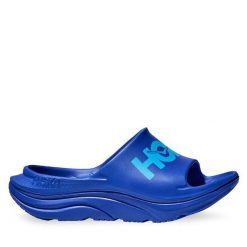 Klapki Hoka. Niebieskie klapki damskie HOKA, bez wzorów, sportowe, bez obcasa, bez zapięcia. Za 229.99 zł.