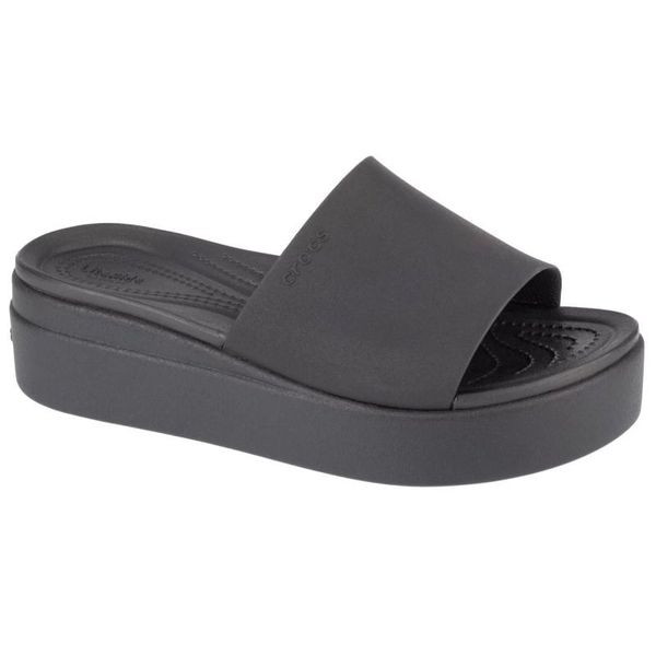 Klapki Crocs Brooklyn Platform Slide 208728-001 czarne. Czarne klapki damskie bez wzorów, casualowe, bez obcasa, na koturnie, bez zapięcia. Za 328.29 zł.