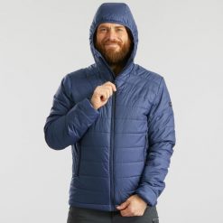 Kurtka trekkingowa męska zimowa Forclaz MT100 - 5°C. Niebieskie kurtki męskie FORCLAZ, na zimę, l, bez wzorów, z materiału, sportowe, bez kaptura. Za 179.99 zł.