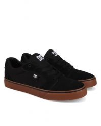Trampki męskie DC Shoes Anvil. Czarne trampki męskie DC Shoes, bez wzorów, z materiału, bez zapięcia. Za 279.99 zł.