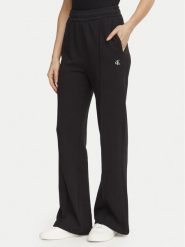 Calvin Klein Jeans Spodnie dresowe Monogram LV047H220G Czarny Regular Fit. Czarne spodnie dresowe damskie Calvin Klein Jeans, bez wzorów, z bawełny. Za 369.99 zł.