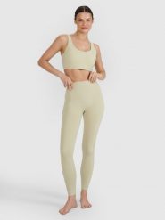 Legginsy do jogi i pilatesu szybkoschnące damskie 4F 4FWSS25TFTIF323. Zielone legginsy damskie 4F, bez wzorów, z dzianiny. Za 91.99 zł.