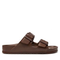 Klapki Birkenstock. Brązowe klapki damskie Birkenstock, bez wzorów, bez obcasa, bez zapięcia. Za 249.99 zł.