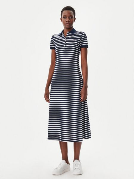 Tommy Jeans Sukienka codzienna DW0DW20383 Granatowy Regular Fit. Niebieskie sukienki damskie Tommy Jeans, na co dzień, s, bez wzorów, z bawełny, bez kołnierzyka, bez ramiączek, proste. Za 249.99 zł.