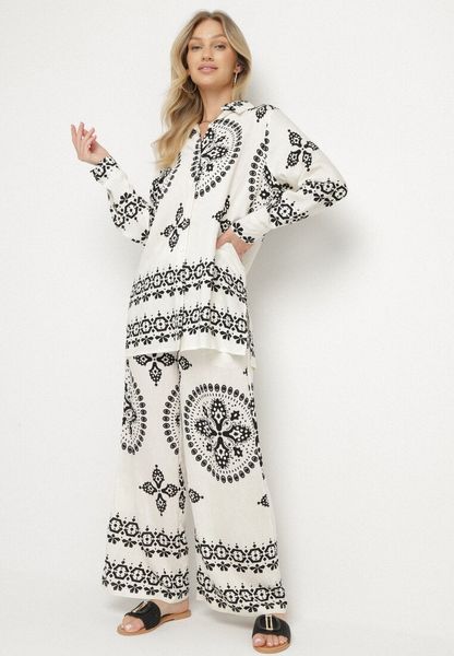 Beżowo-Czarny Wiskozowy Komplet w Etniczny Wzór Koszula i Szerokie Spodnie Pasilia. Brązowe koszule damskie Born2be, l, z aplikacjami, z wiskozy, eleganckie, bez kołnierzyka, bez ramiączek. Za 119.99 zł.