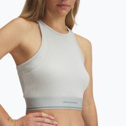 Top treningowy damski Under Armour Meridian Rib Branded Tank hydro. Zielone topy damskie Under Armour, bez wzorów, bez kołnierzyka, bez ramiączek. Za 129.99 zł.