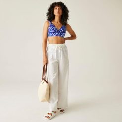 Góra od stroju kąpielowego damska Paloma. Niebieskie bikini Regatta, bez wzorów, z tkaniny. W wyprzedaży za 94.90 zł.