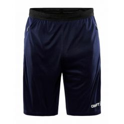 Spodenki treningowe męskie Craft Evolve Zip Pocket. Niebieskie spodnie materiałowe męskie Craft, bez wzorów, z dresówki. Za 167.00 zł.