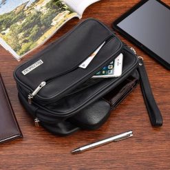 Czarna skórzana saszetka męska duża dwukomorowa do ręki Beltimore G58. Czarne saszetki i nerki męskie do ręki, duże. Za 109.90 zł.