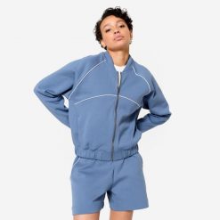Bluza fitness bomberka damska Domyos. Niebieskie bluzy damskie DOMYOS, xl, bez wzorów, z bawełny, sportowe, bez ramiączek, bez kaptura. W wyprzedaży za 119.99 zł.