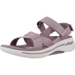 Sandały SKECHERS GO WALK ARCH FIT SANDAL Fioletowy. Fioletowe sandały damskie Skechers, bez wzorów, z tkaniny, bez obcasa, bez zapięcia. Za 291.99 zł.