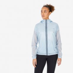 Kurtka turystyczna damska Quechua MH900 Light. Niebieskie kurtki sportowe damskie QUECHUA, l, bez wzorów, z materiału, bez ramiączek, bez kaptura, trekkingowe. W wyprzedaży za 89.99 zł.