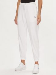 Tommy Jeans Spodnie dresowe Script DW0DW17771 Biały Relaxed Fit. Białe spodnie dresowe damskie Tommy Jeans, bez wzorów, z dresówki. Za 249.99 zł.
