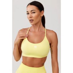 Stanik sportowy bezszwowy Rough Radical Seamless Glow Bra. Żółte bielizna sportowa damska ROUGH RADICAL, bez wzorów. W wyprzedaży za 103.92 zł.